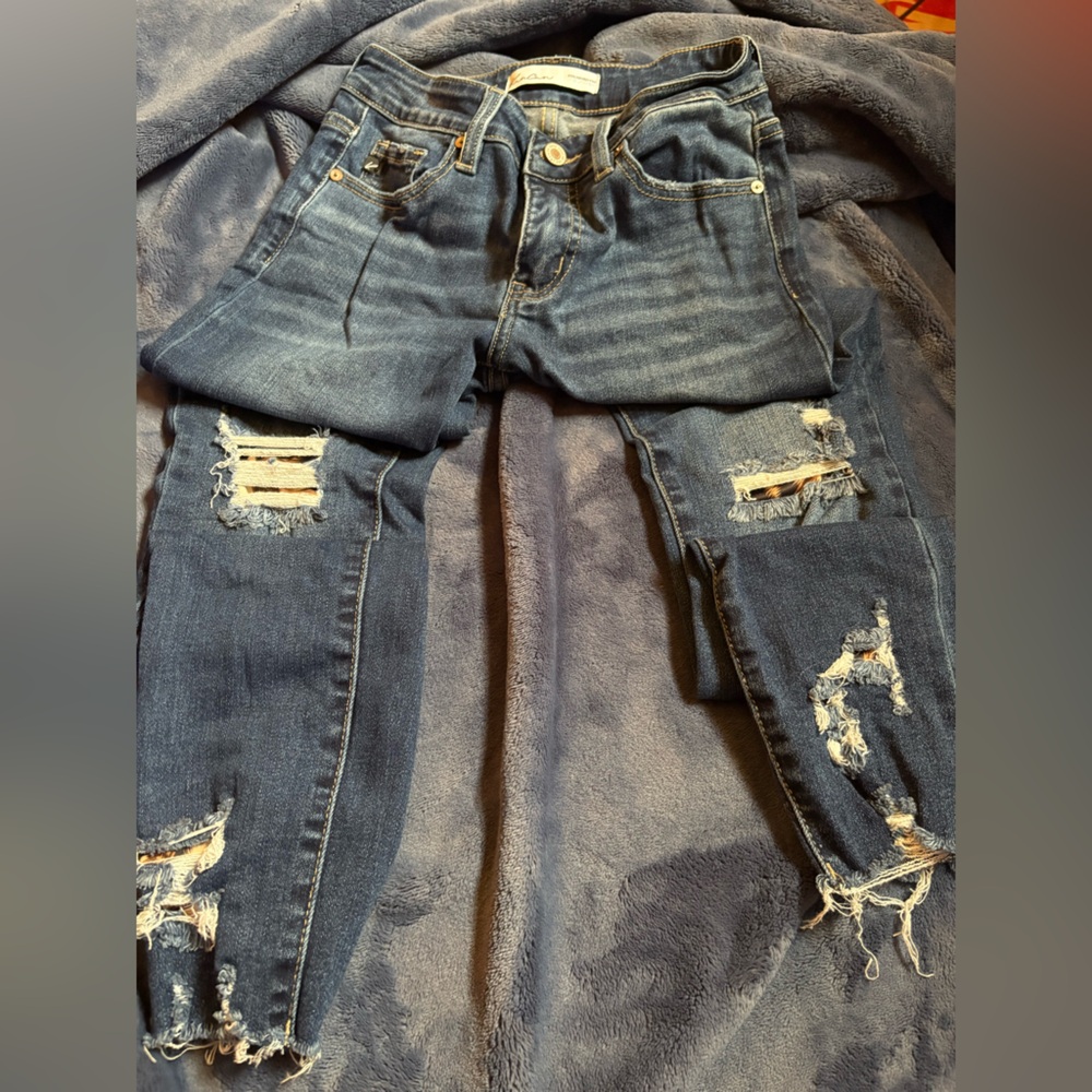 Women's Distressed Blue Jeans